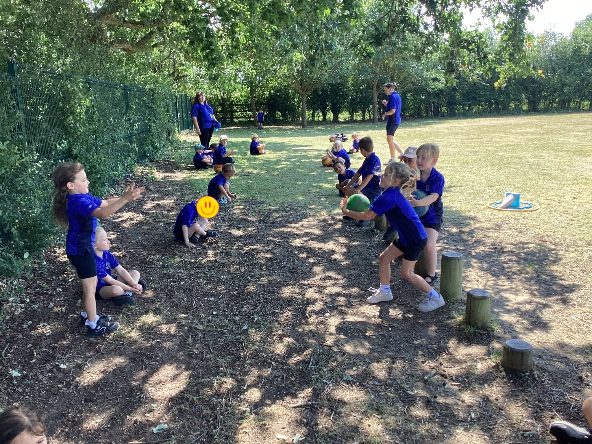 Woolpit pupils playing on a field