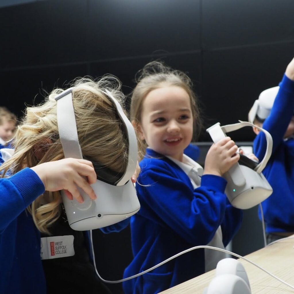 Girls with virtual reality headsets