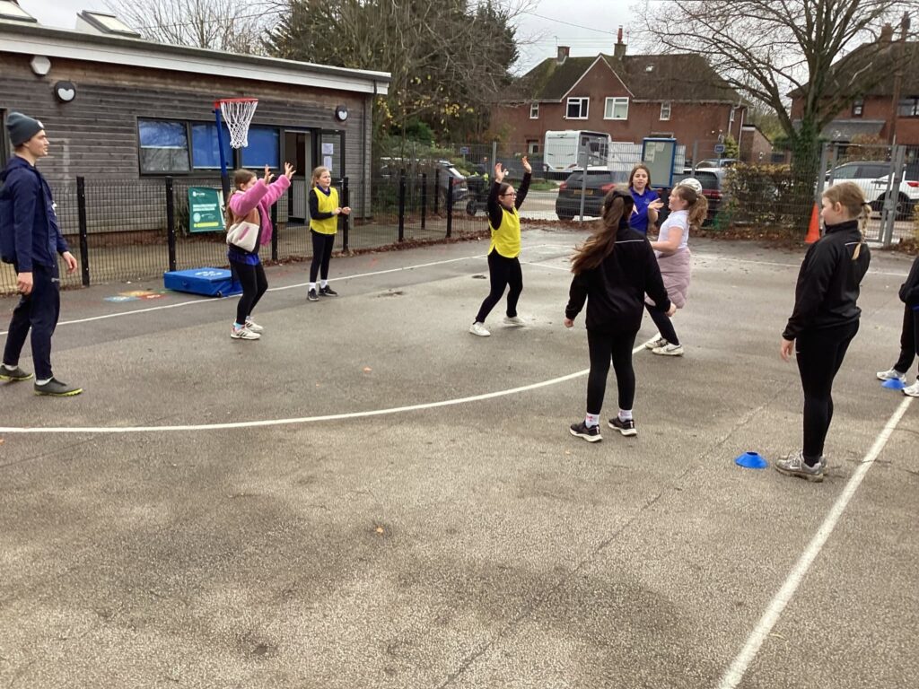 Woolpit Primary Academy pupils playing netball